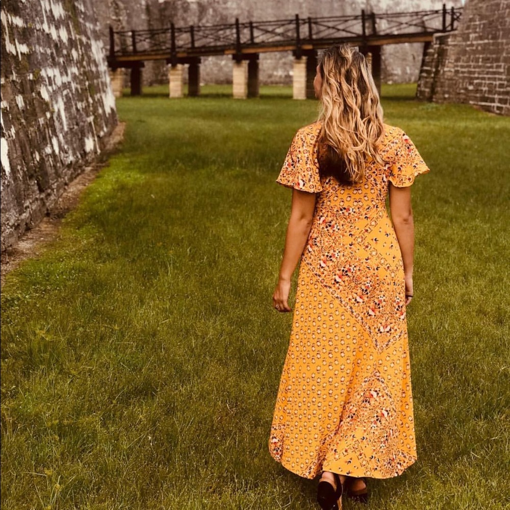 Sunset color dress with floral and patterns
